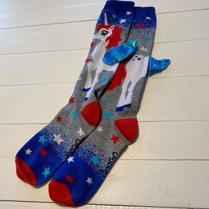 Justice unicorn red, white, and blue socks.